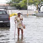A senior citizen making her way along Middle Street [Photos by Delano Williams)