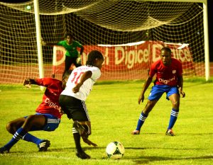 Part of the action in yesterday’s Digicel School football Championship Regional finals (Adrian Narine photo)