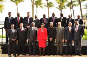 President David Granger (fourth from right, front row) with colleague CARICOM Heads at the summit in Barbados. (Photo courtesy Ministry of the Presidency)  