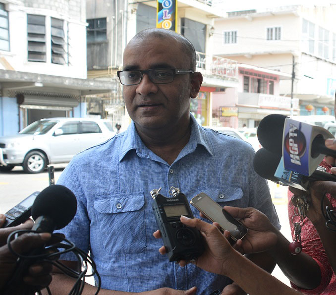 Former president, Mr Bharrat Jagdeo offering his comment to the media yesterday while the picket was in full flow