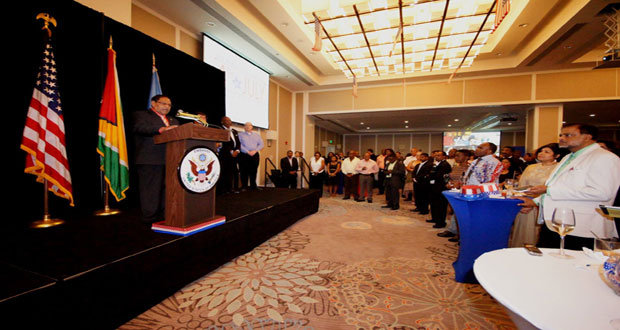 Acting President Moses Nagamootoo delivers his address to the gathering on the occasion of the reception for the 239th Independenc Anniversary of the United States, at the Marriott Hotel in Kingston