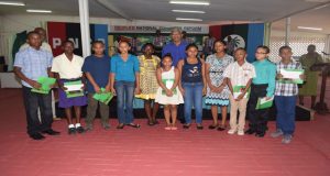President David Granger and this year’s BEST bursary award recipients at Congress Place yesterday 