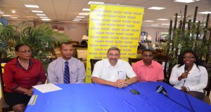 From left to right: AAG’s Assistant Competitions Director Yvonne October, president Aubrey Hudson, COURTS Managing Director Clyde De Haas, representative of the National Sports Commission (NSC) Seon Erskine and COURT’s Roberta Ferguson at the head table.
