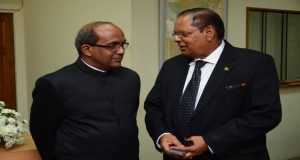 Prime Minister Moses Nagamootoo interacting yesterday with Indian High Commissioner Venkatachalam Mahalingam 