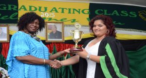 One of the outstanding students who graduated last Friday, Sherifa Valenzuela, receiving her award from Regional Chairperson Genevieve Allen