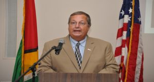 Christopher Cushing Mission Director, USAID Eastern and Southern Caribbean, addresses the gathering at the Pegasus Hotel. 