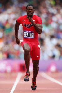 Justin Gatlin of the U.S. crosses the finish line as he wins the men's 200-metre semifinal. (Reuters/David Gray)
