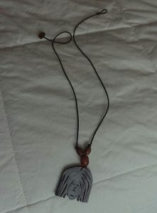 The rubber pendant chain, taking the form of a Rastaman’s head