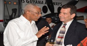  President David Granger shares a light moment with CEO Correia Group of Companies Michael Correia Jr. after the commissioning of the Beechcraft 1900D aircraft