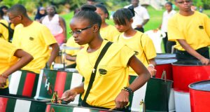 Candace Holder absorbed in a performance with fellow Bishops’ students at Sunday’s national steelpan show  