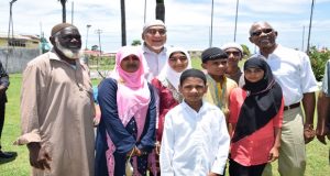 President David Granger and CIOG President Fazeel Feroze pose for a photo with some of those who attended the CIOG Fun Day, yesterday (Kawise Wishart/GINA photo)