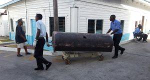 The body of Amanda being wheeled to the GPHC morgue. 