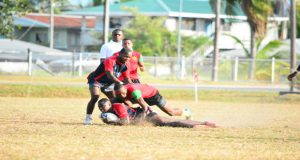 GDF’s Patrick King takes down Pepsi Hornets’ Blaise Bailey in a prelim match of the Banks Beer Rugby Sevens Tournament. (Samuel Maughn Photo)