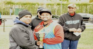 Dant’s MVP Avi Singh collects his winning trophy from OSCL executive Vish Jadunauth.