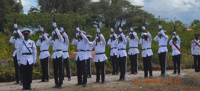 The Guyana Police Force in a 21-gun salute [Cullen Bess-Nelson photo)