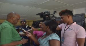 Minister Joseph Harmon speaking to the press on Sunday during the PNC regional conference at Vreed-en-Hoop, Region 3 (Cullen Bess-Nelson photo)