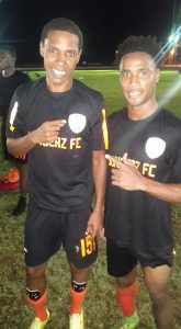 Slingerz FC’s Anthony Abrams (left) and Vurlon Mills