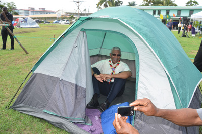 President Granger nestled in a tent at the scouts’ campsite.