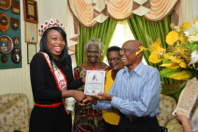 Miss Guyana World, Lisa Punch, and Georgetown Mayor Hamilton Green were equally excited, as he handed her a plaque in recognition of her success at the Miss World pageant in Sanya City, China (Samuel Maughn photo). 