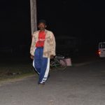 Fed up, some walk the street contemplating their next move, while a man sits alone to clear his mind