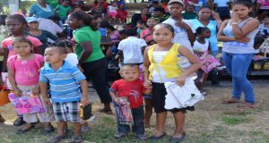 Several children at Friendship, Pomeroon River shortly after receiving their gifts