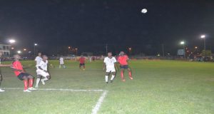 The Riddim Squad defenders mark closely their semi-final opponents Santos FC. 