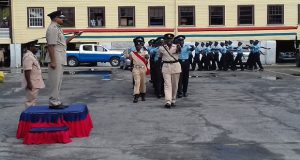 The other graduates getting ready to give the Commissioner of Police the “eyes right” salute during a march-past