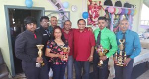 Prime Minister Moses Nagamootoo, Regional Executive Officer Dr. Verasammy Ramayya, and other officials with some of the awardees