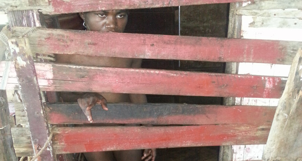 This 31-year-old woman was naked in her “cage” shortly before being rescued