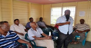 Private Cane farmer Deodat Deokenanan making a point during the meeting yesterday afternoon 