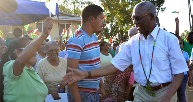 President David Granger greets enthusiastic residents of Mabaruma, North West District and surrounding communities Wednesday afternoon shortly before a public meeting during which he outlined his vision to turn the community into a township [Alva Solomon photo)