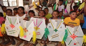 Children of Good Hope/Lusignan display their kites gifted them by President Granger 