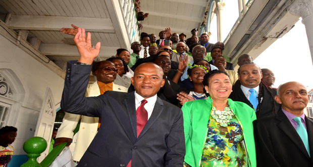 Deputy Mayor Sherod Duncan waves as Mayor Patricia Chase-Green, Minister of Communities Ronald Bulkan and other councillors of the Georgetown Municipality look on