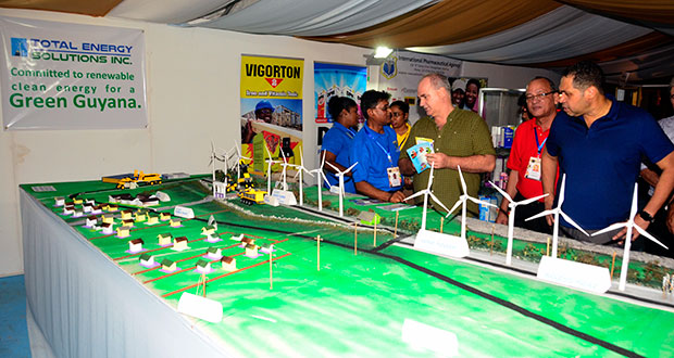 Patrons view the model of the wind farm project at the Sophia Exhibition Complex last evening