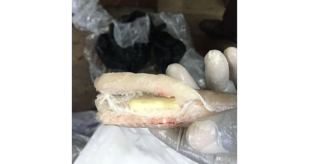 Police released this image of the cocaine in the frozen fish.