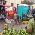 Vendors moving their fruits and provision away from the scene of the crime 