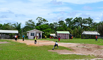 The cricket match which was in session during the visit.