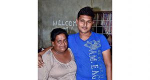  Narindra Persaud and his mom. The aspiring doctor, whose father is a fisherman, thanked his parents for working hard to give him all he needed for school