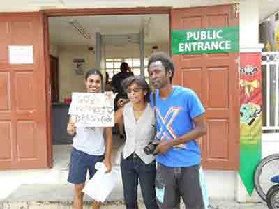 (Protesters at the Guyana Revenue Authority, where they went to thank the GRA for relaxing their dress code policy. Photo Credit: Sherlina Nageer)