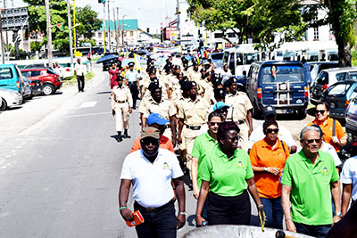 Acting Chief Education Officer, Marcel Hutson; Assistant Chief Education Officer, Leslyn Edwards-Charles; and Minister of Education, Dr. Rupert Roopnaraine, leading the Education Month march from Stabroek Market Square to Durban Park