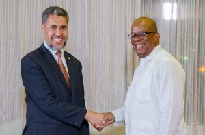 Minister of Finance Winston Jordan shakes hands with Mr Sayed Aqa, Vice President of the Islamic Development Bank at the Guyana Marriott Hotel Wednesday evening [Delano Williams photo)