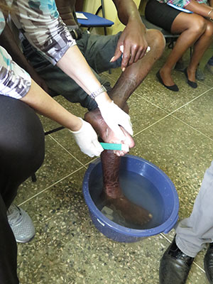 A doctor conducting foot care 