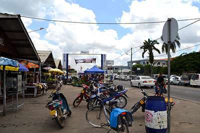 Several motorcycles parked outside the Nickerie Market