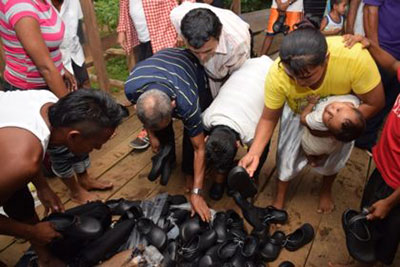 Some of the shoes Minister within the Ministry of Indigenous Peoples’ Affairs Valarie Garrido-Lowe distributed to the residents