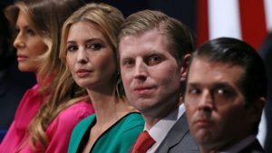 Children (second left to right, seen here sitting beside Melania) Ivanka, Eric and Donald Jr are already involved in the business