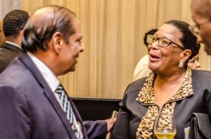 Prime Minister Moses Nagamootoo, who is performing the functions of President, greets former Director General of the Ministry of Foreign Affairs Elizabeth Harper prior to the launch of the African Business Roundtable on Friday at the Marriott Hotel