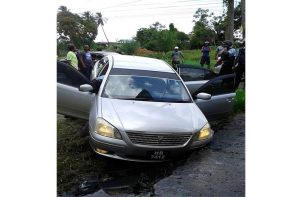 : The car which the bandits were using. [Timothy Bhagwandin photo) 
