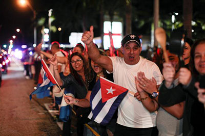 People celebrate after the announcement of the death of Cuban revolutionary leader Fidel Castro, in the Little Havana district of Miami, Florida, U.S. November 26, 2016. (REUTERS/Javier Galeano)