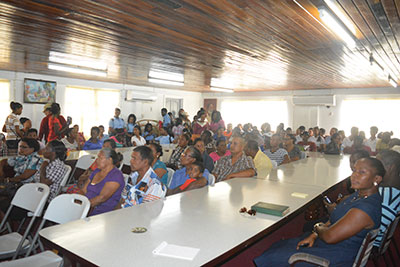 Essequibo residents gathered yesterday at the RDC headquarters where the distribution exercise was held  
