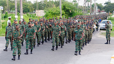 Troops of the Guyana Defence Force march through the streets of Georgetown during the Force’s 51st Anniversary Route March on Saturday